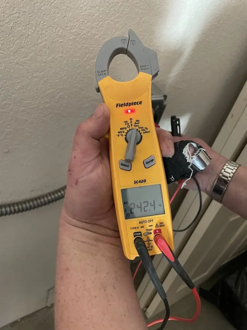 Voltage testing with clamp meter during Electrical Installation Services in Spanish Fork